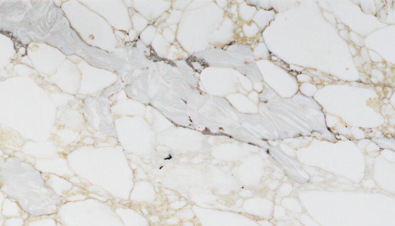     vagli oro quartz close up showing gold and grey veining