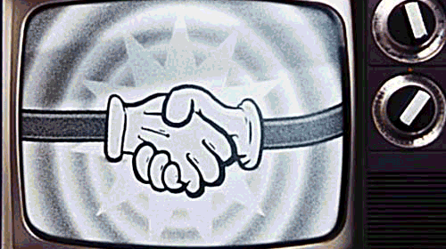 A retro cartoon animation of a handshake on a vintage TV screen, symbolizing agreement or partnership.