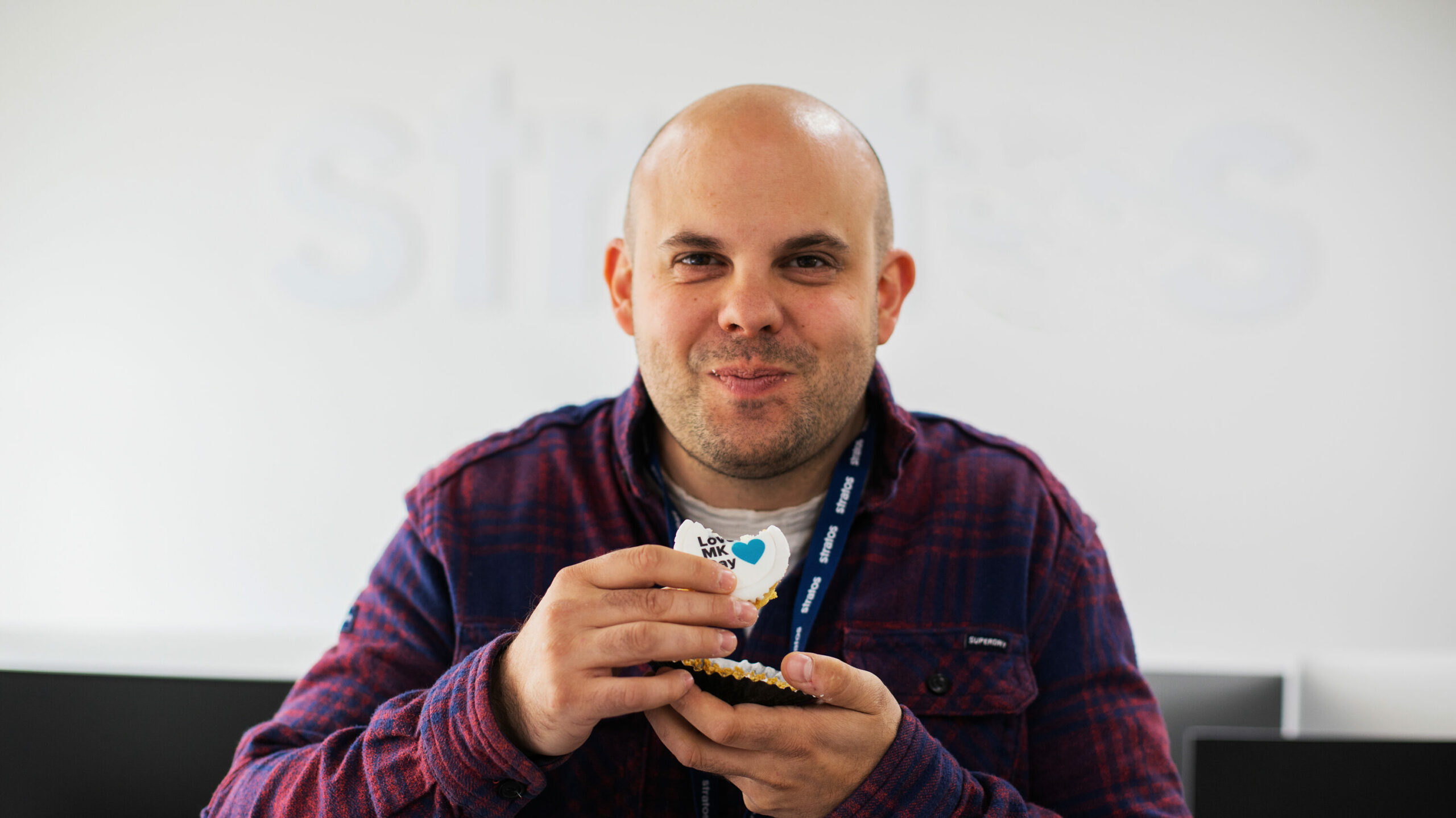 Marc enjoying a celebratory cupcake in our Milton Keynes office.