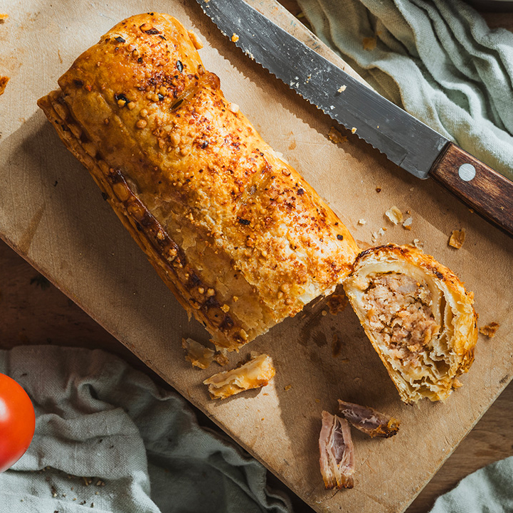 The Original Baker branding by Stratos Creative, featuring a Sausage Roll