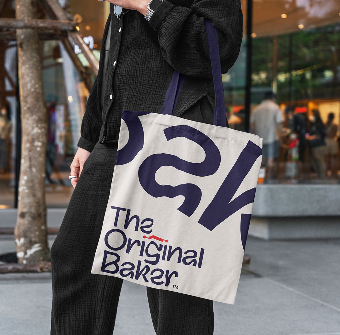 The Original Baker branded tote bag.