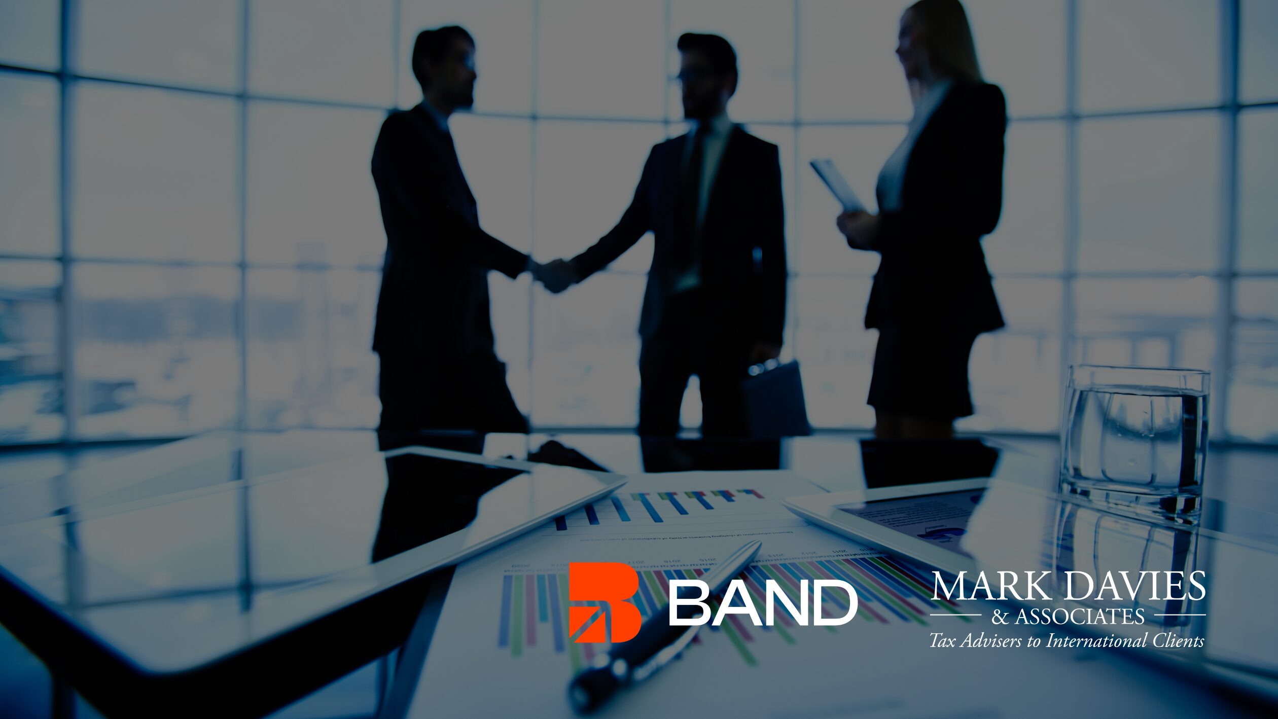 three-professionals-shaking-hands