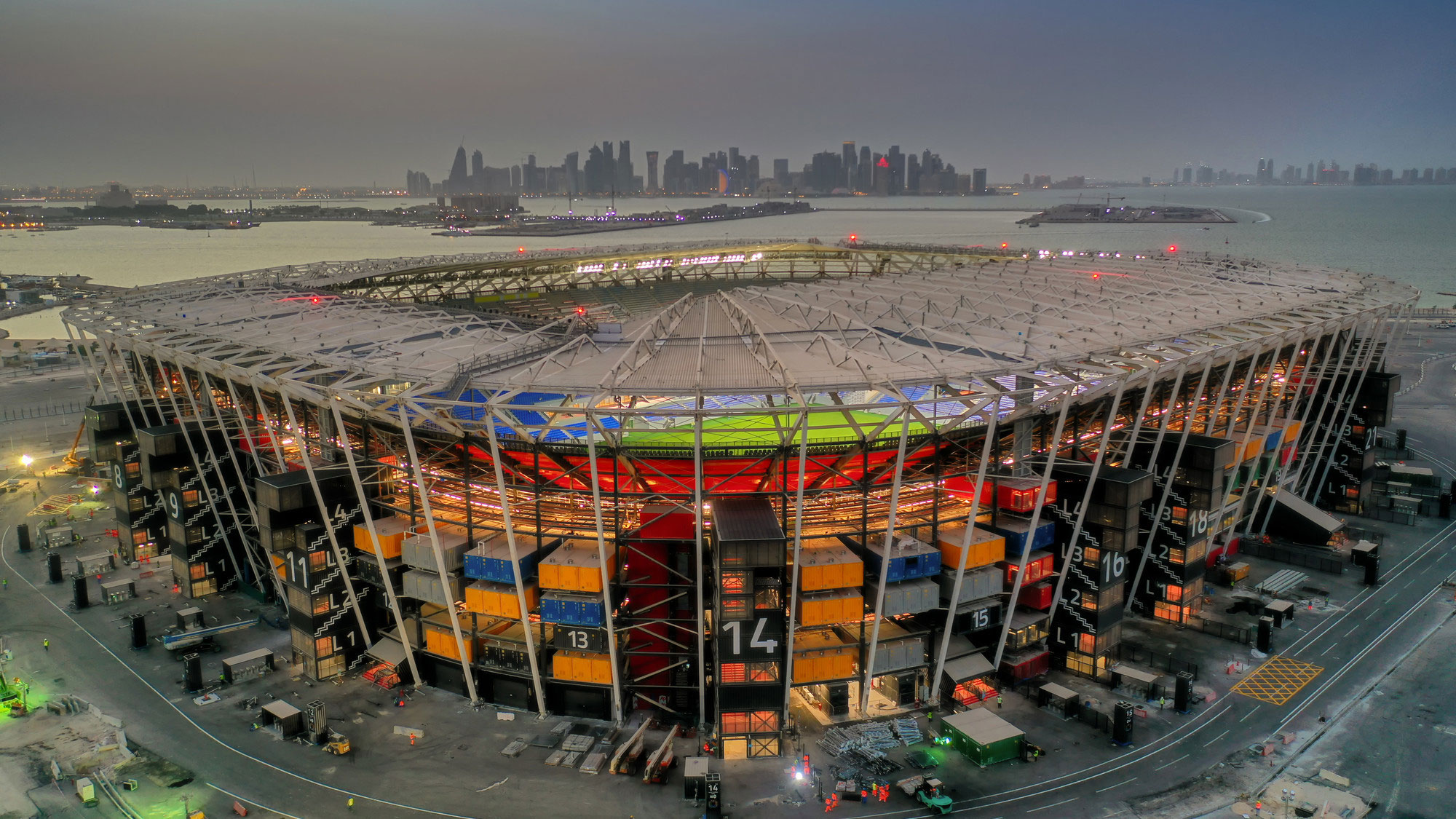 Birds eye view of football stadium constructed from sea containers
