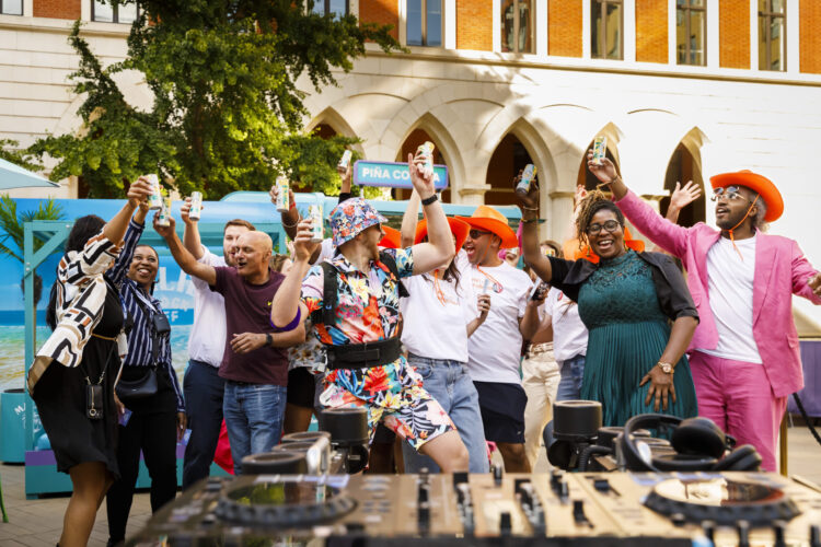 Group of people cheering and celebrating